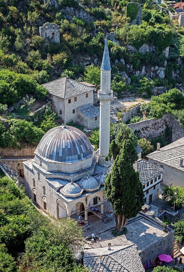 The Hajji Alija Mosque built in 1563 in Pocitelj fortified village over Neretva river, Bosnia and Herzegovina.