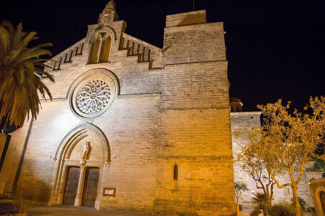 Alcudia walled village in Majorca island in Spain Nightscape. Sant Jaume church by night.