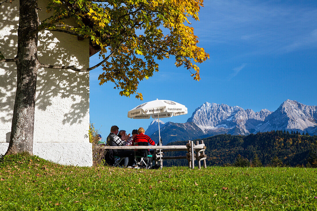 At mountain restaurant Gschwandtnerbauer near Garmisch-Partenkirchen with Karwendel mountains, Upper Bavaria, Germany, Europe