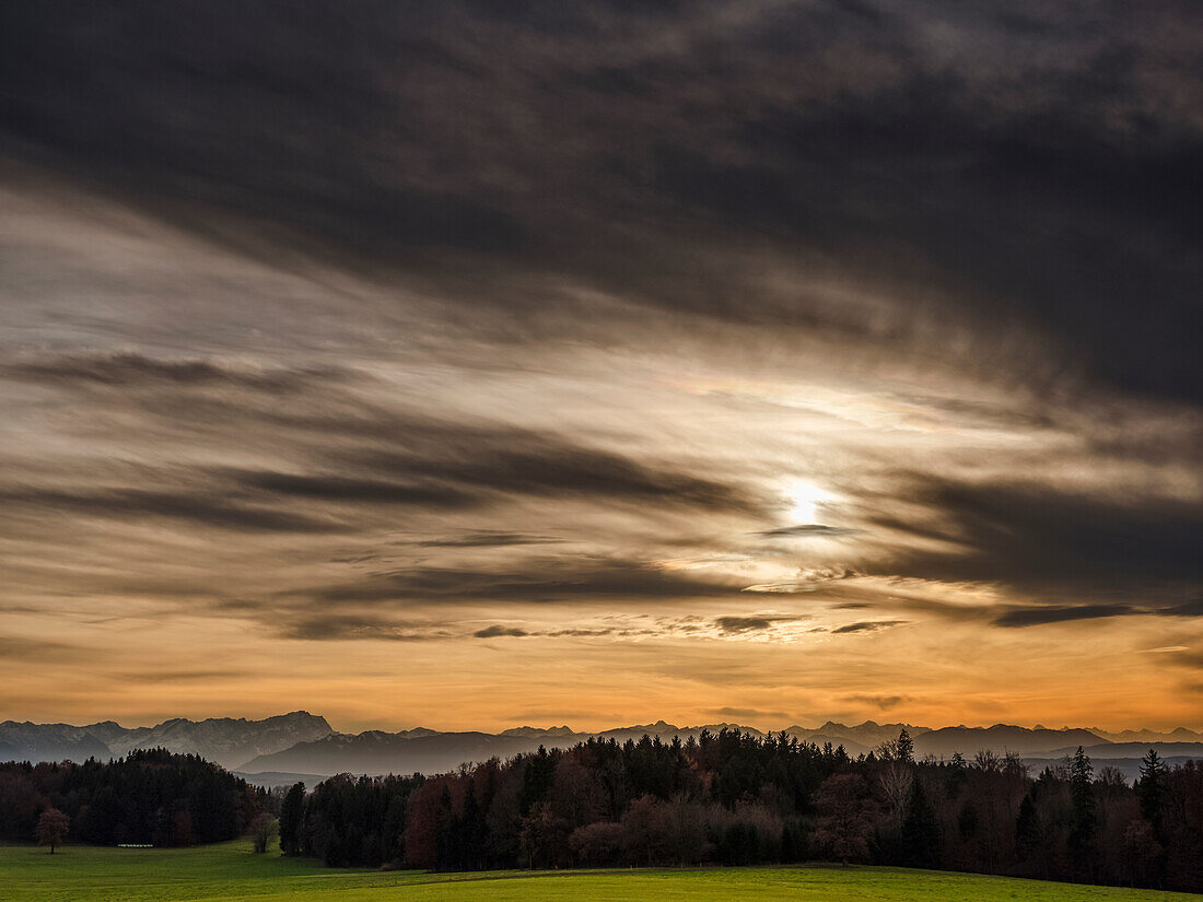 View from Degerndorfer Hoehe to the alps before sunset, Zugspitze on the left, Muensing, Upper Bavaria, Germany