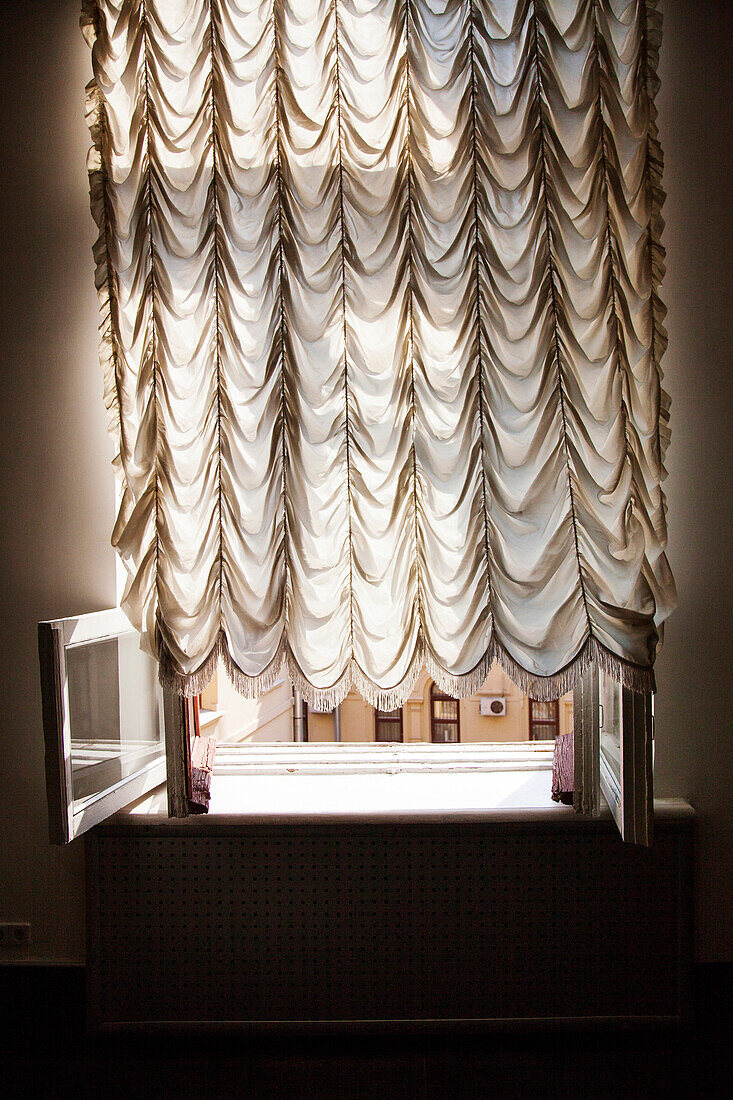 RUSSIA, Moscow. Window and curtain at the Polytechnic Museum.