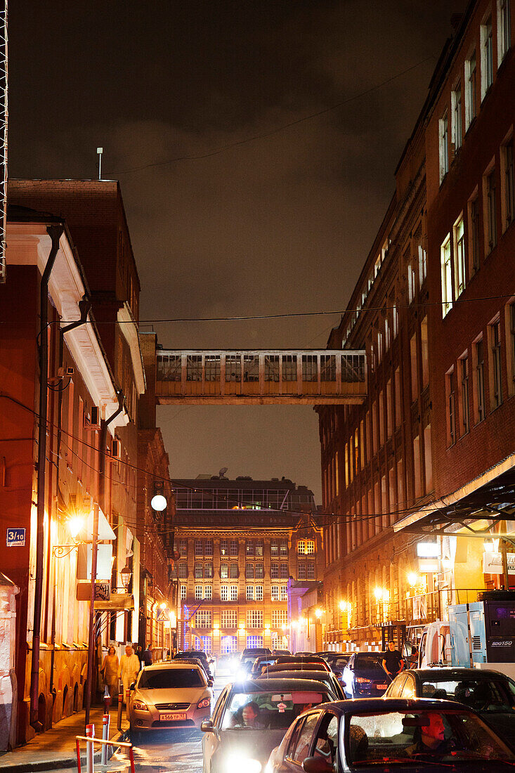 RUSSIA, Moscow. Night scene at Red October, a former chocolate factory that has reopened new bars and restaurants.