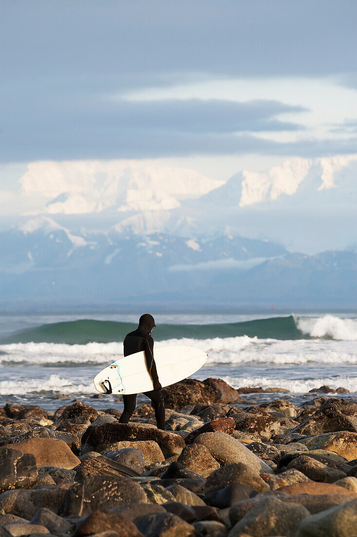 Surfer On The Beach Near Yakutat, Southeast Alaska, USA