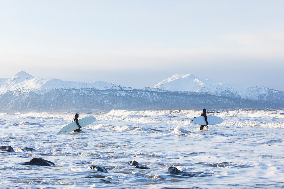 Surfers Entering Kachemak Bay Along Homer Spit, Southcentral Alaska, USA