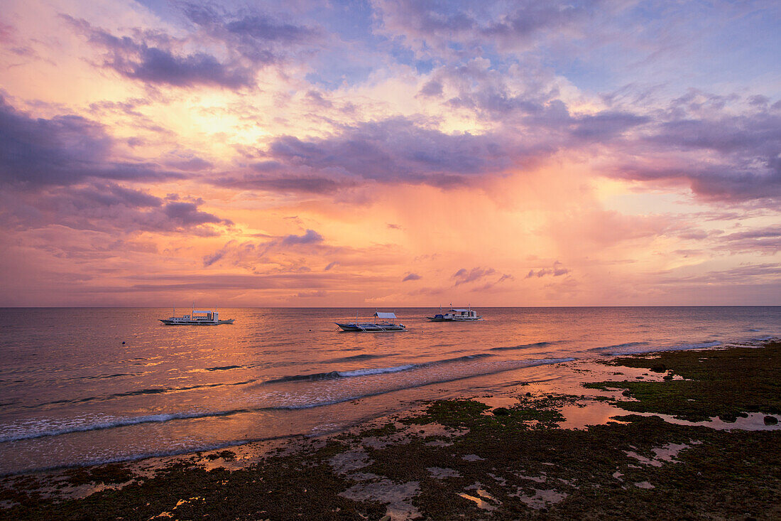 Sunset Over The Ocean With Pump Boats; Anda, Bohol, Central Visayas, Philippines