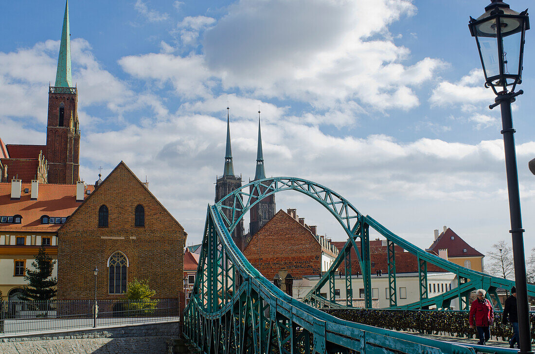 Tumski Bridge And Lovers Locks With Spires Of Cathedral In The Background; Wroclaw, Lower Silesia, Poland