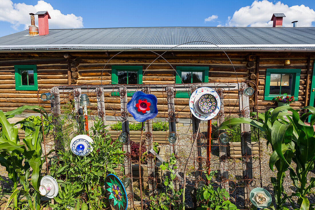 Decorations adorn a garden outside the Sullivan Roadhouse Historical Museum; Delta Junction, Alaska, United States of America