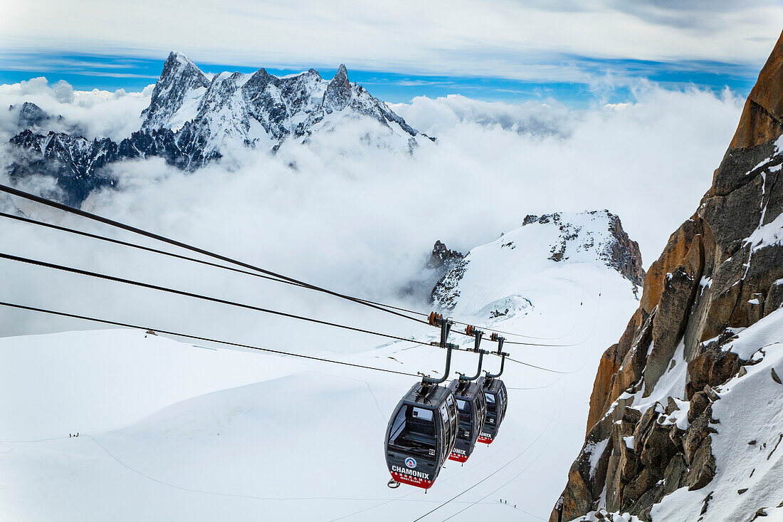 Panoramic Mont Blanc gondola at Aiguille du midi, Aiguille de Rochefort peaks in the background; Chamonix-Mont-Blanc, Haute-Savoie, France