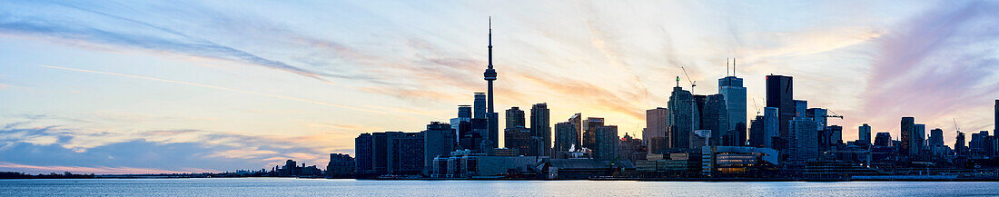 Skyline Of Downtown Toronto And Lake Ontario At Sunset; Toronto, Ontario, Canada