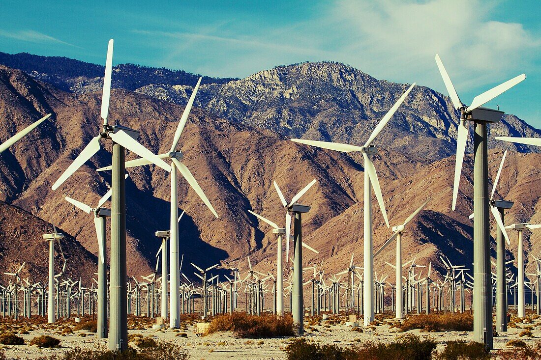 Wind turbines and rugged mountains in Palm Springs, California