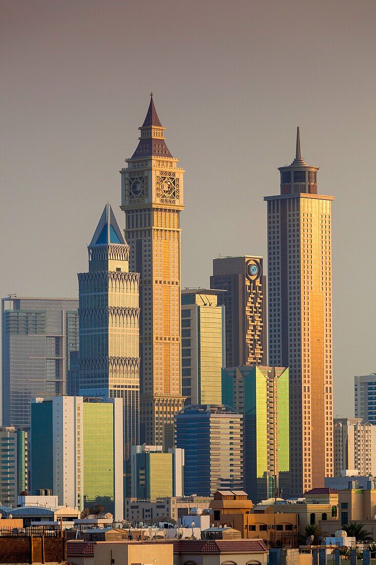 UAE, Dubai, Jumeira, skyscrapers along Sheikh Zayed Road, skyline from Jumeira, dusk.