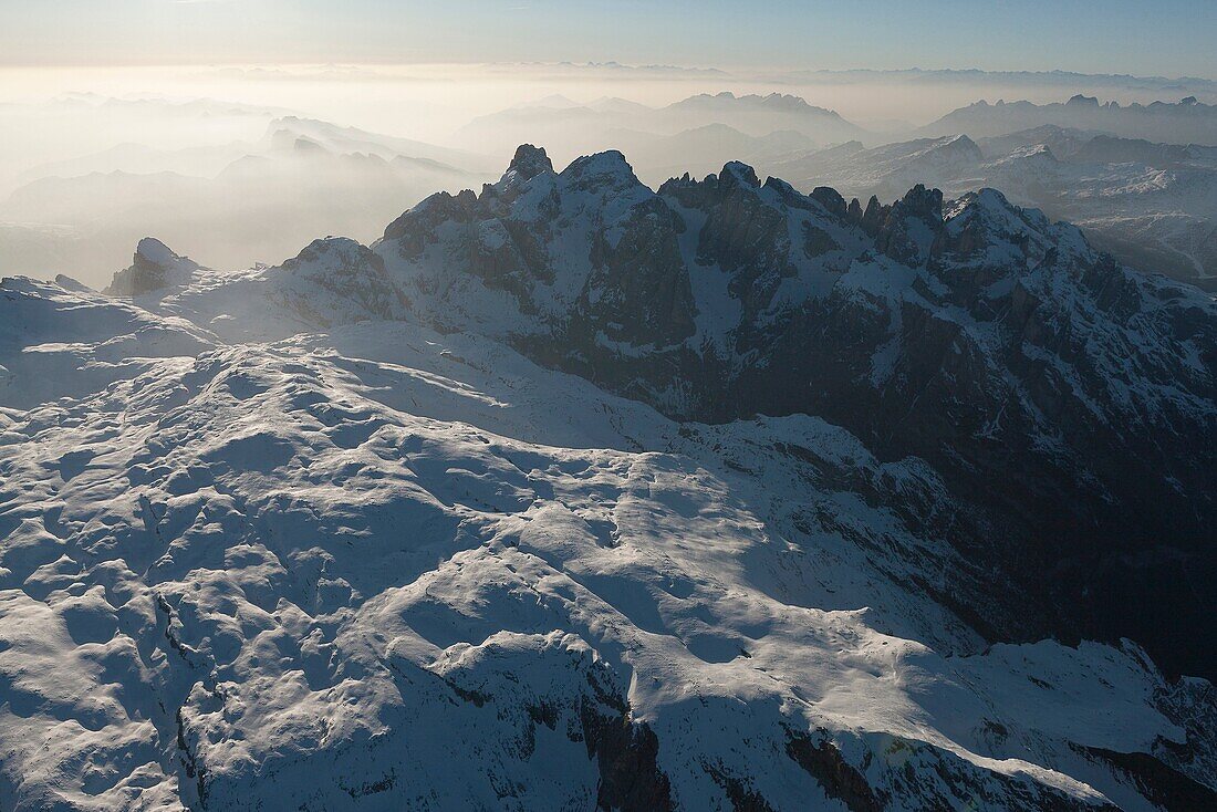 Aerial view of the great plateau of Paneveggio natural park, Pale di San Martino groups, Dolomites. Trento province, Trentino Alto Adige region. Italy, Europe.