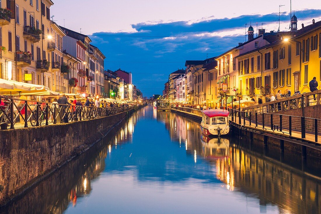 Milan, Lombardy, Italy. The Big Naviglio at dusk.