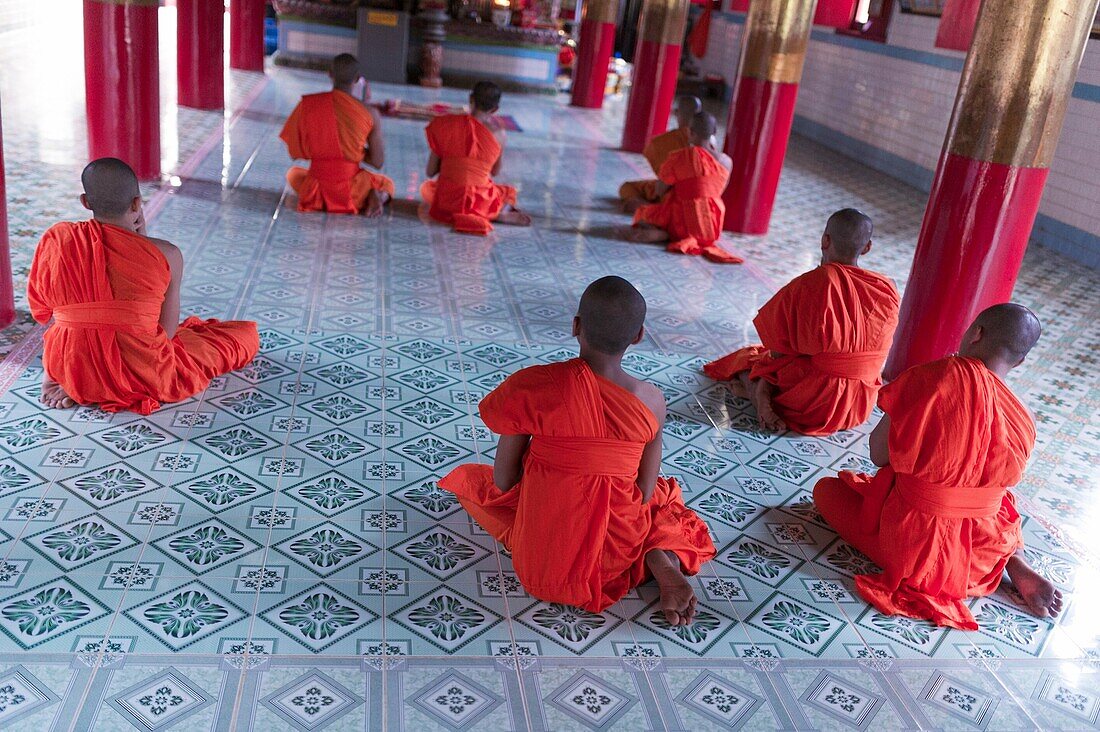 Tra Vinh, Mekong Delta, Southern Vietnam. Khmer Krom monks praying in the temple.