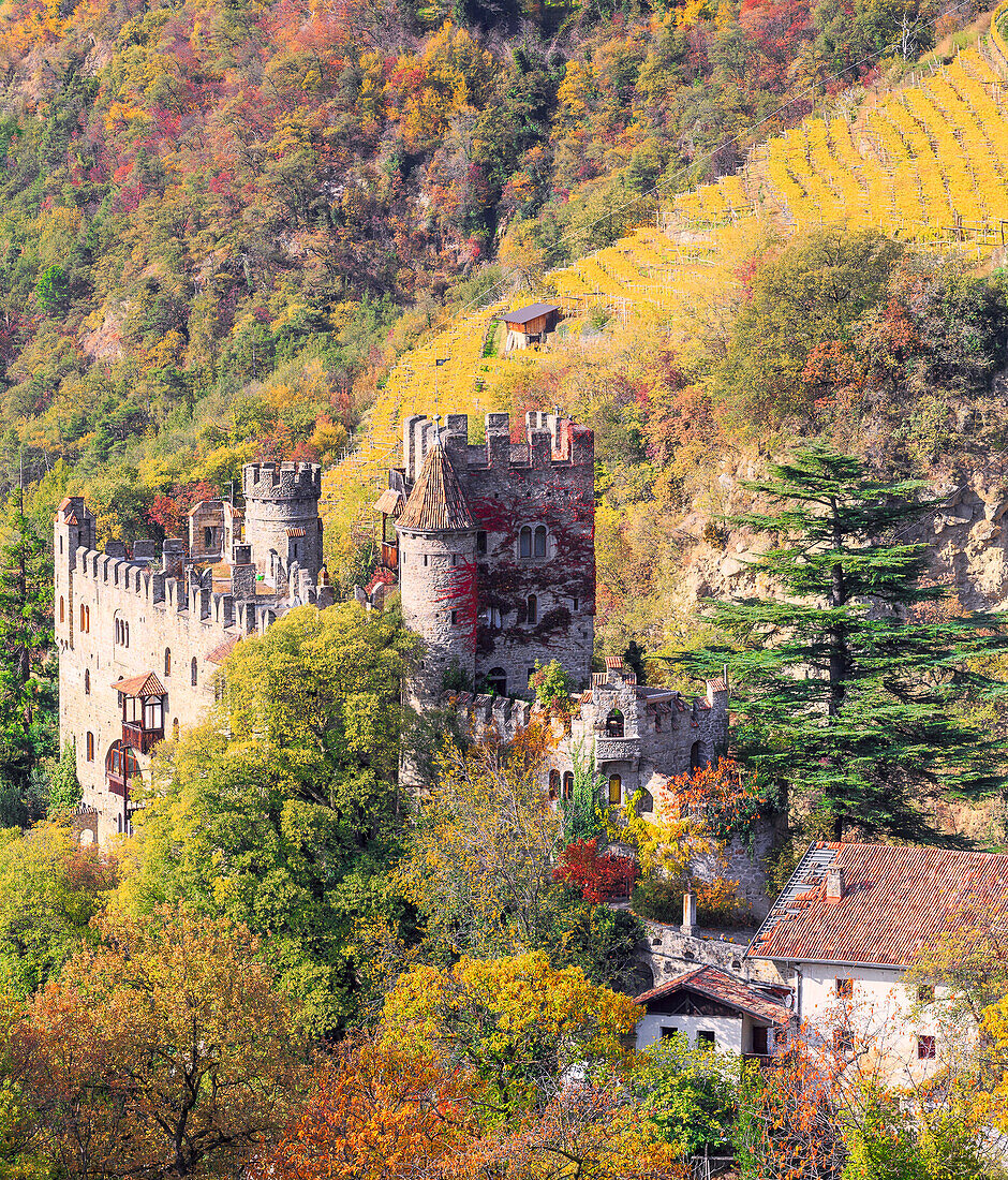 Fontana Castle surrounded by colors of autumn. Merano, Sudtirol, Italy.