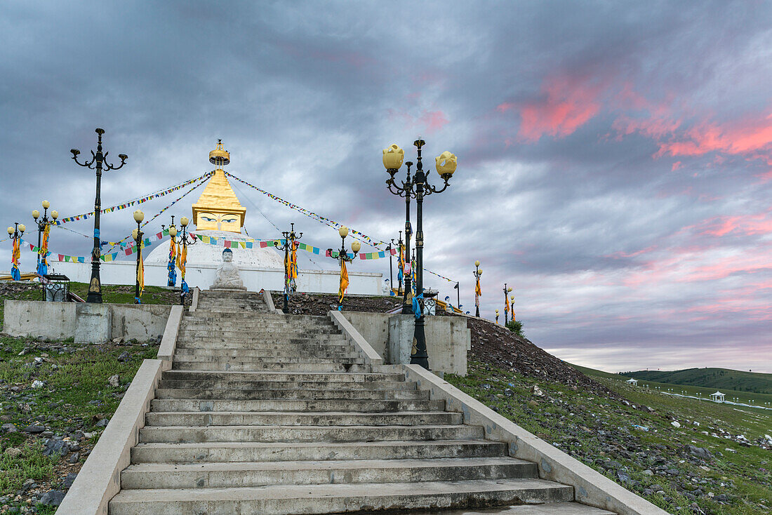 Stairs to the Ovoo above Amarbayasgalant Monastery at sunset. Mount Buren-Khaan, Baruunburen district, Selenge province, Mongolia.
