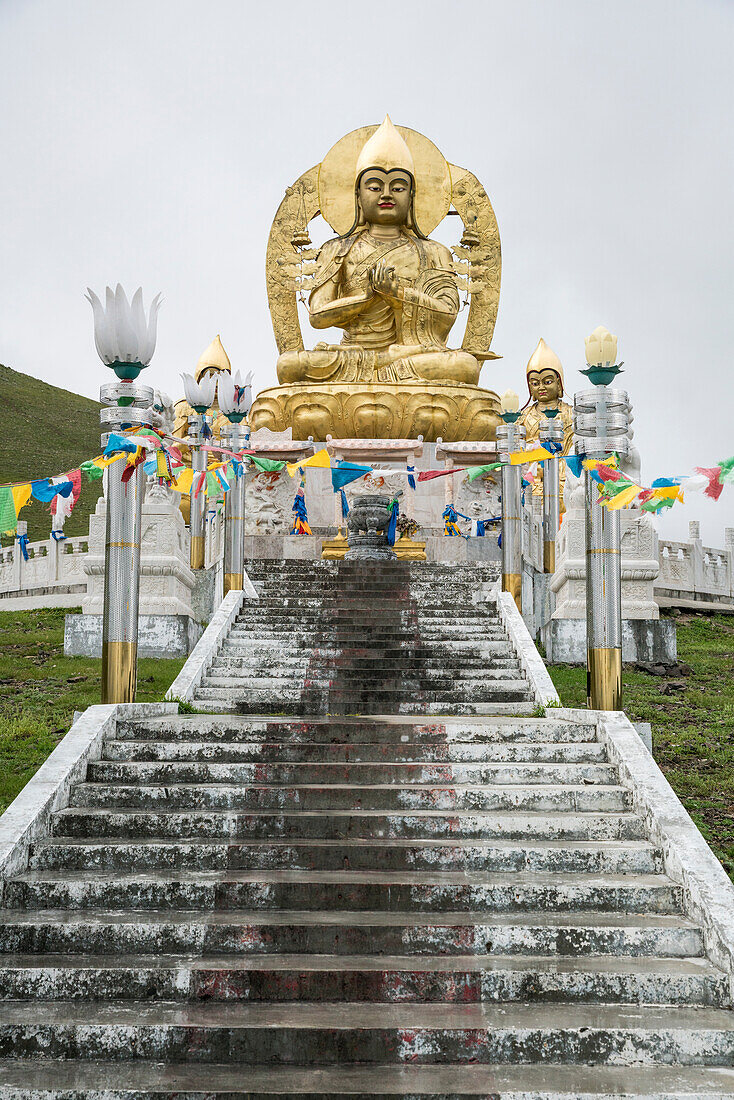 Golden Buddhist statues above Amarbayasgalant Monastery. Mount Buren-Khaan, Baruunburen district, Selenge province, Mongolia.