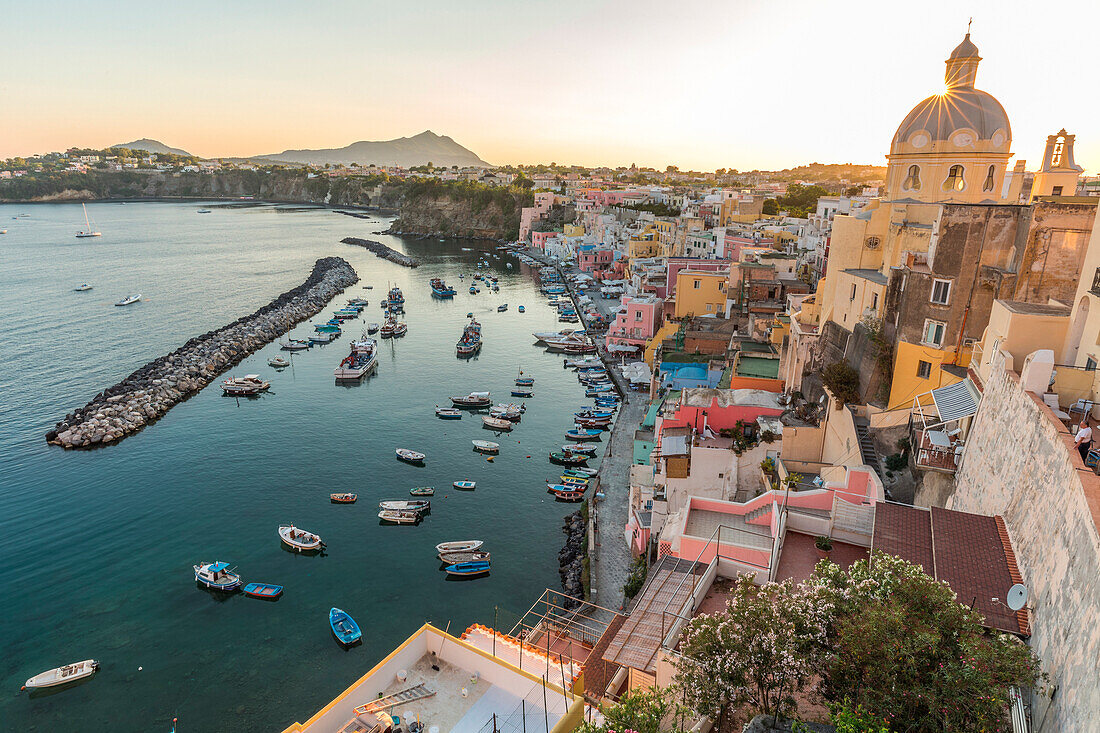 Italy, Campania, Province of Naples, Procida, Sunset at Marina di Corricella