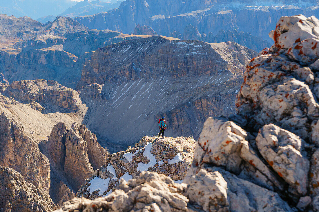 A alpin climber along via ferrata of Sass Rigais. Odle group, Val Gardena, Tretino Alto Adige, Italy