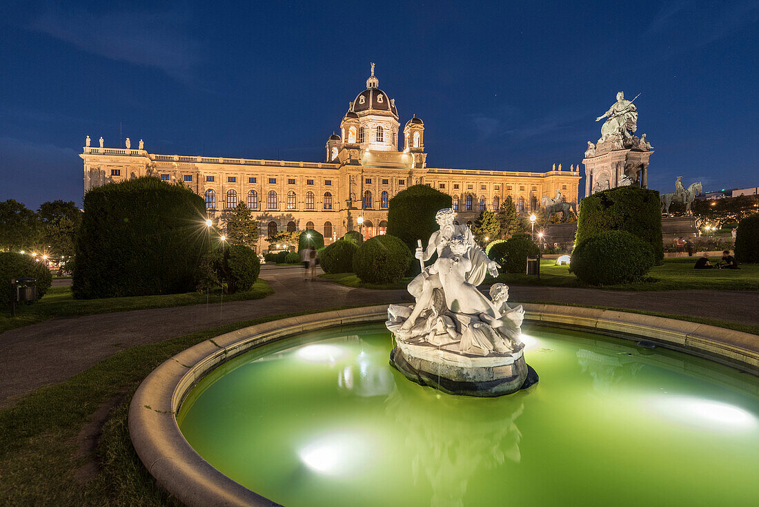 Vienna, Austria, Europe. Tritons and Naiads fountain on the Maria Theresa square with the Art History Museum in the background