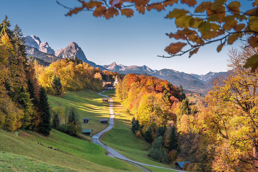 Wamberg, Garmisch-Partenkirchen, Bavaria, Germany. The little Wamberg village with the Mount Zugspitze and the Mount Waxenstein