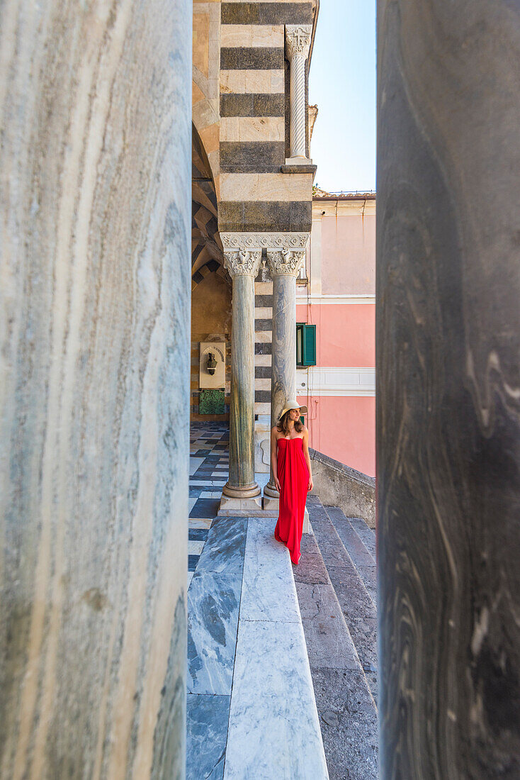 Amalfi,Amalfi Coast,Salerno Province,Campania,Italy Girl walks for the Amalfi Cathedral.