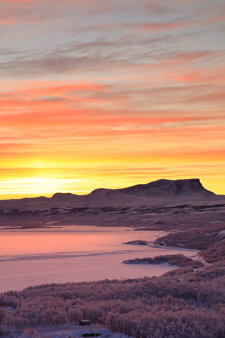 Sunrise on the snowy landscape, Bjorkliden, Abisko, Kiruna Municipality, Norrbotten County, Lapland, Sweden