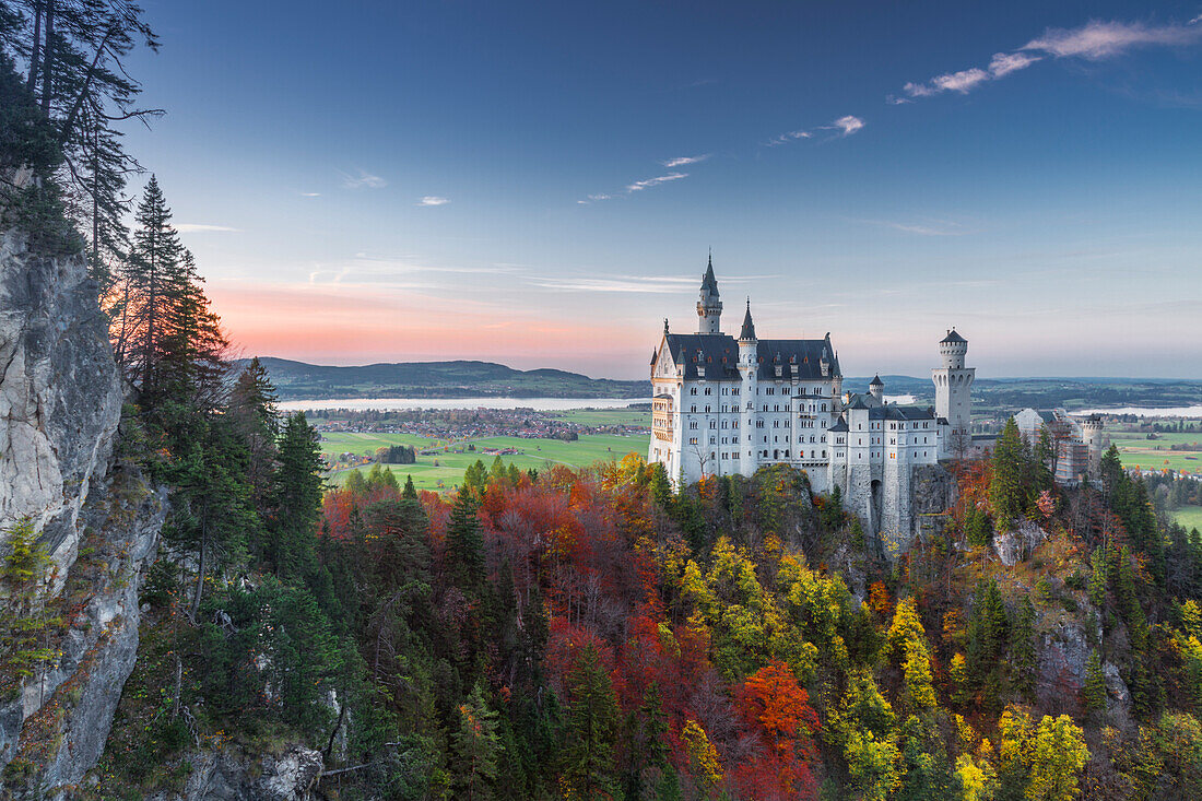 Neuschwanstein Castle in Autumn at dawn. Schwangau, Fussen, Southwest Bavaria, Bavaria, Germany, Europe