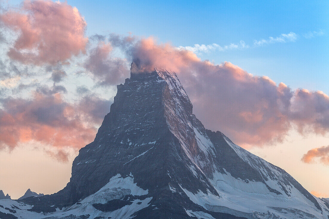 Matterhorn surrounded by clouds. Zermatt Canton of Valais Pennine Alps Switzerland Europe