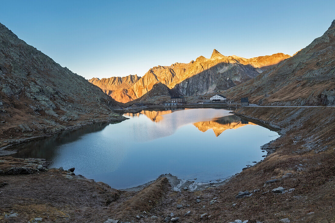 Sunrise at lake of Gran San Bernardo Pass in autumn