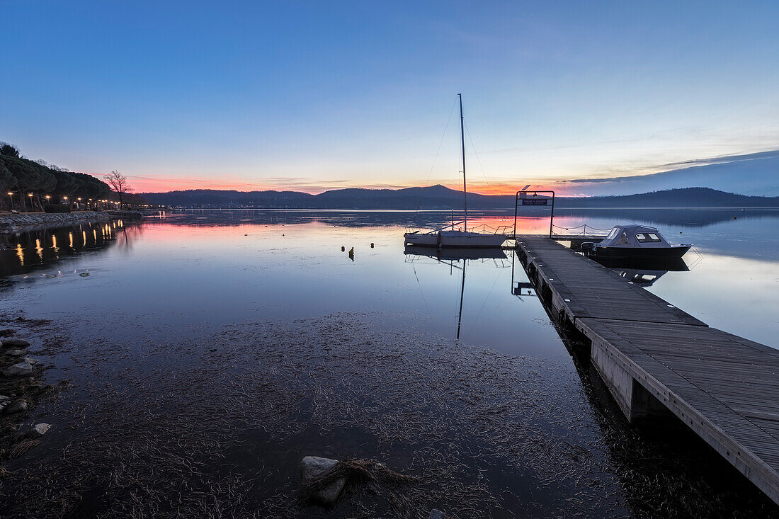 Little pier on Viverone lake at sunset, Viverone, Biella, Piedmont, Italy, Europe