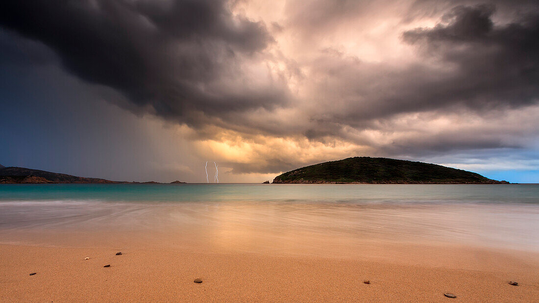 Tuerredda sunset before the thunderstorm, Teulada, Sardinia, Italy