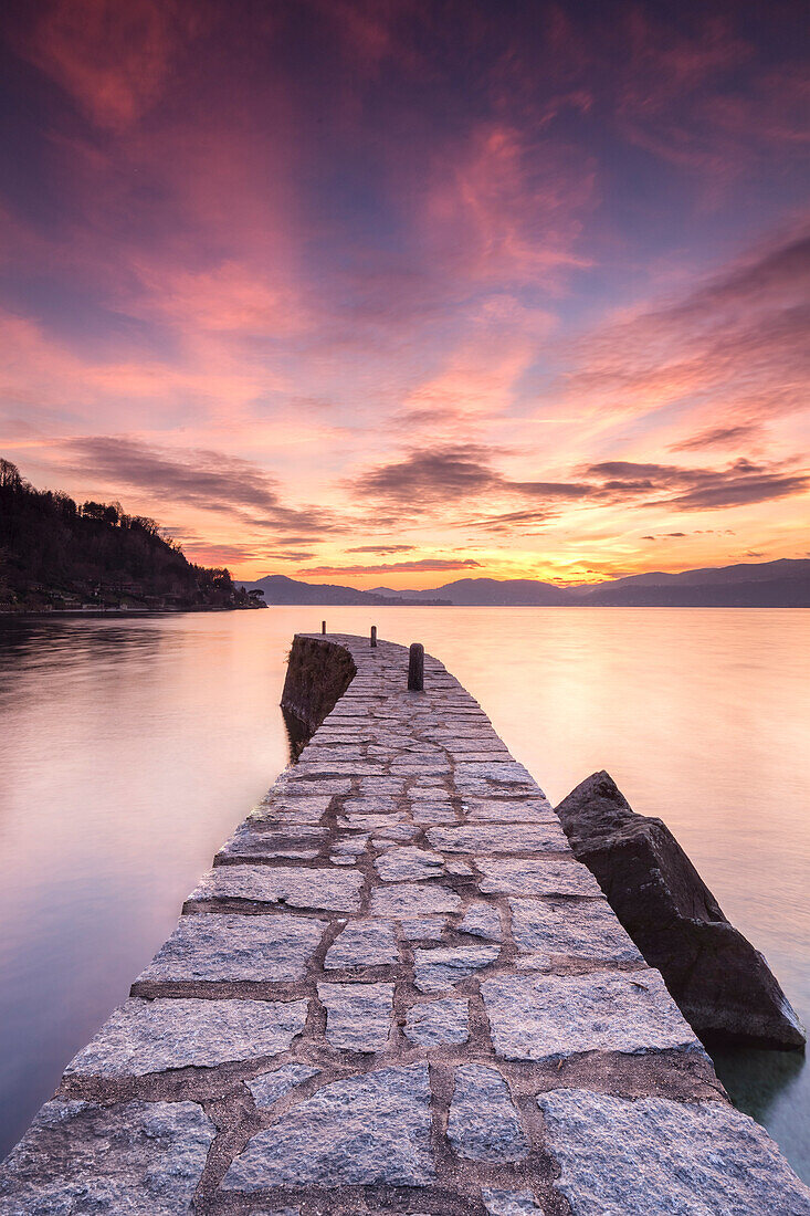 Sunset at the old pier, Lake Maggiore, Ispra, Varese Province, Lombardy, Italy.