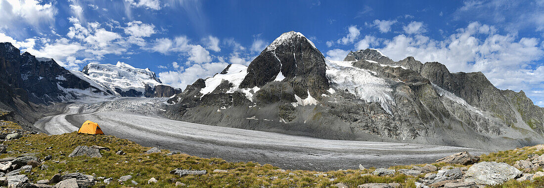 Camping on the ridge of moraine, close to the Grand Combin glacier, Grand Combin on background,Switzerland,Swiss