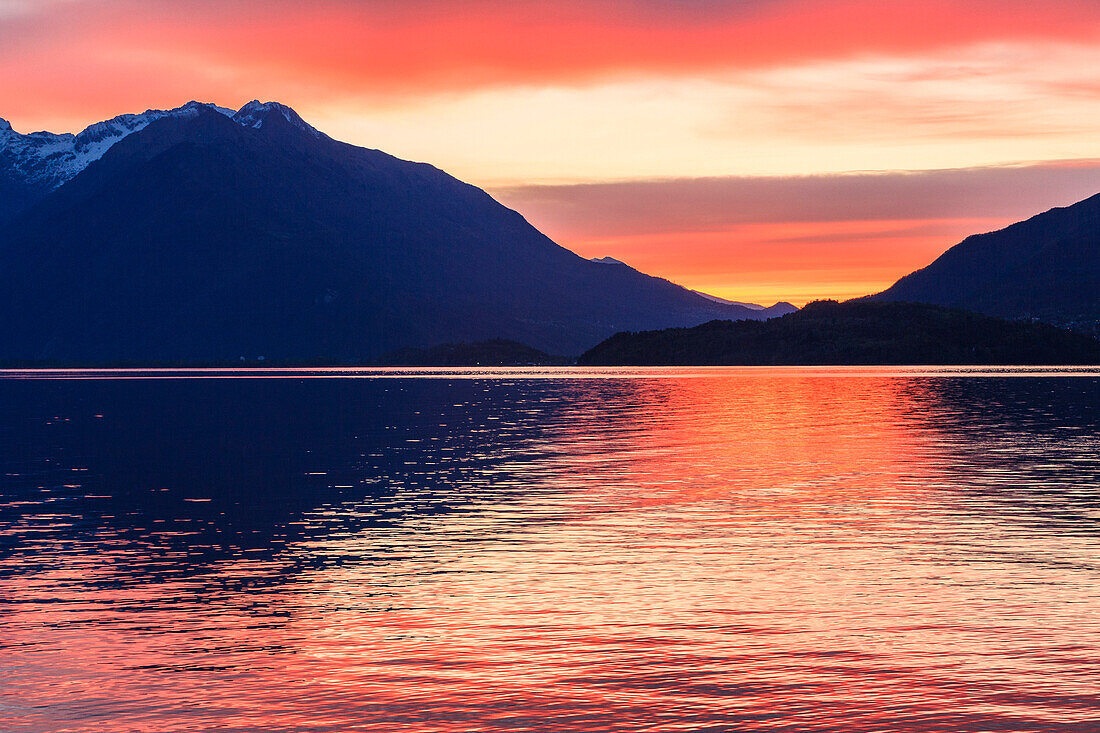 Sunrise on the Como lake of Domaso village, Lombardy, Italy, province of Como