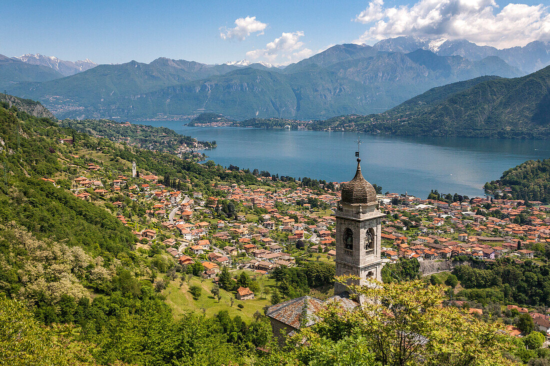 Santa Maria del Soccorso church on the Lenno village of the Como lake. The swan of Como lake at sunset. Lombardy, Italy, provence of Como