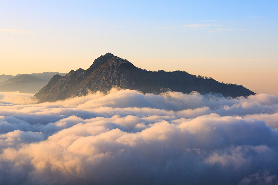 Fog at dawn seen from Monte San Martino Province of Lecco Lombardy Italy Europe
