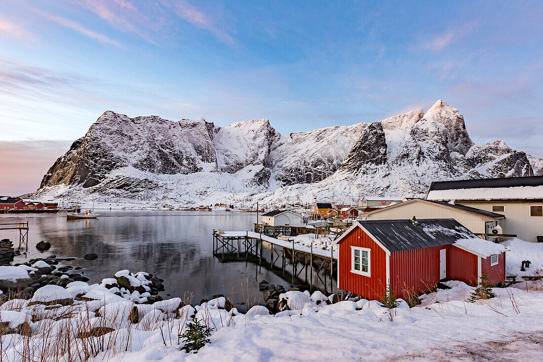 Small dock at Reine at sunrise in winter, lofoten islands, nordland, norway, europe