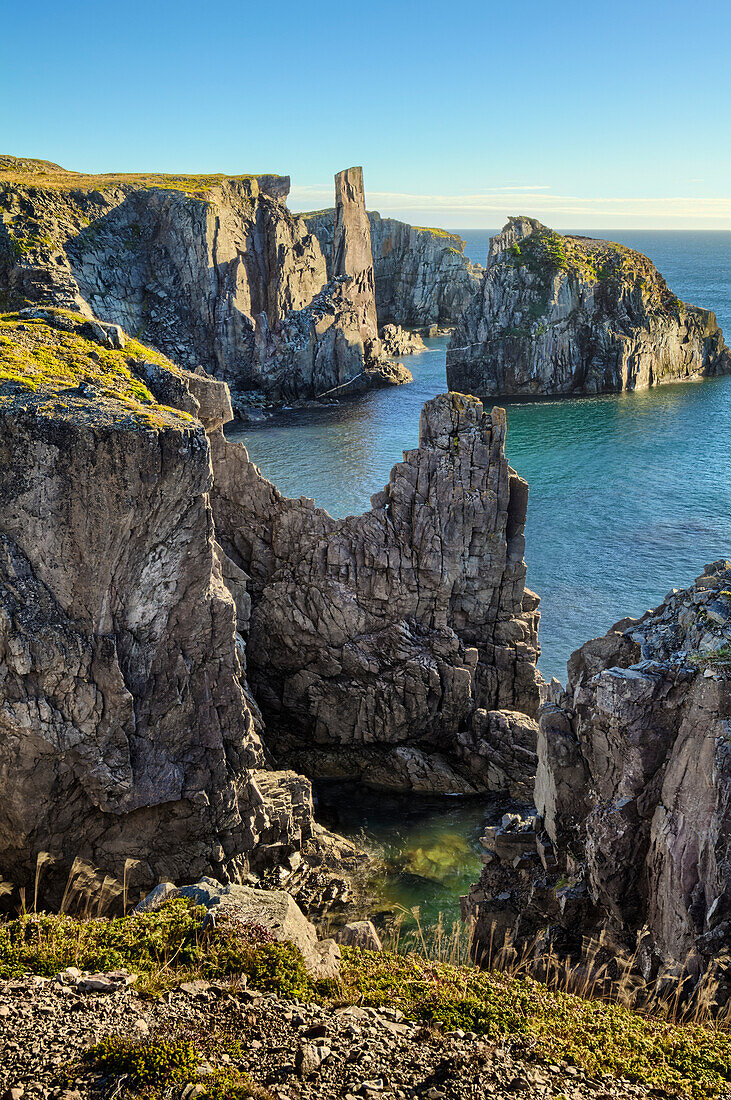 Rugged rock cliffs along the Atlantic coastline; Newfoundland, Canada