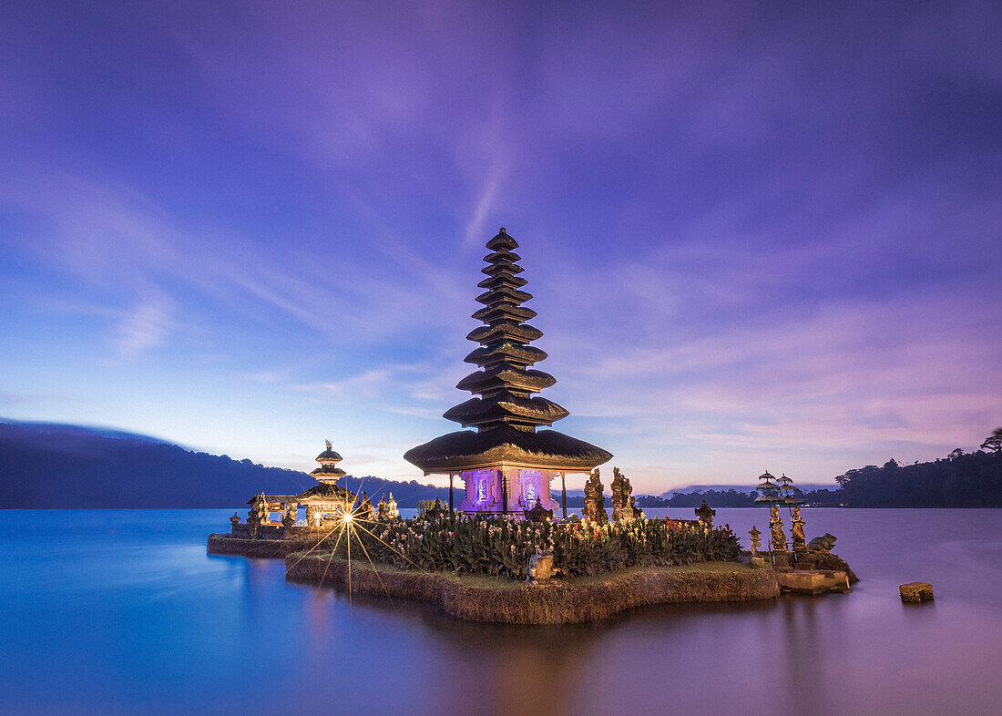 Pura Ulun Danu Bratan water temple with pagoda at sunset, Baturiti, Bali, Indonesia