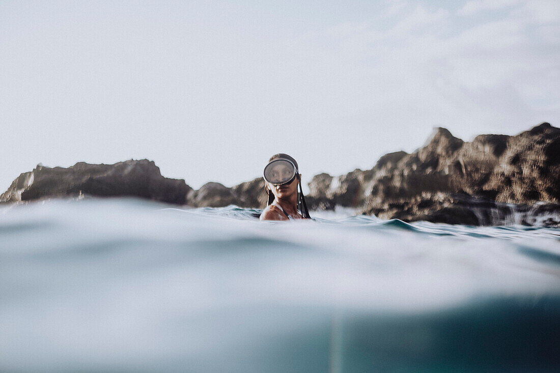 Woman swimming in scuba mask in sea, Tenerife, Canary Islands, Spain