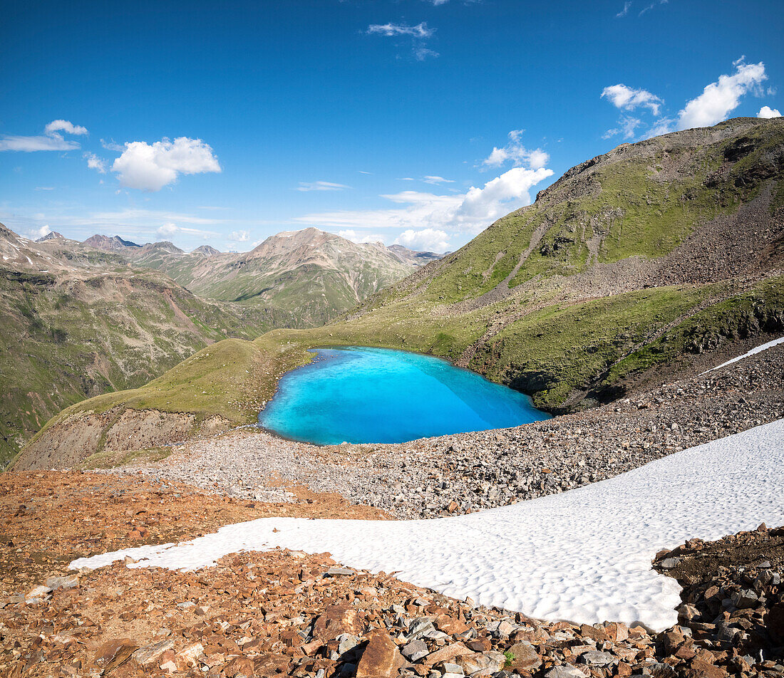 The last snow of the year at Lago Vago, Livigno, Province of Sondrio, Valtellina, Lombardy, Italy, Europe