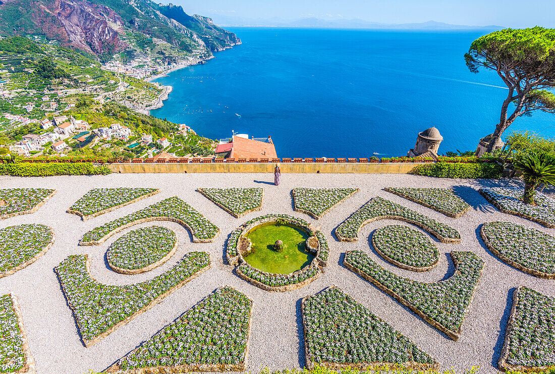 Villa Rufolo, Ravello, Amalfi coast, Salerno, Campania, Italy. A girl is standing in the garden of Villa Rufolo