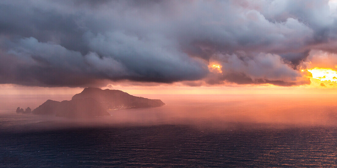 Capri, Napoli, Campania, Italy, Storm over Capri island at sunset