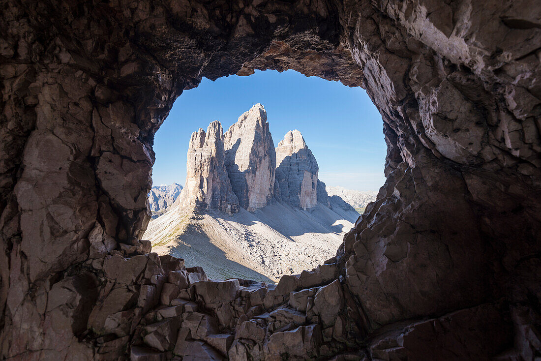 Sesto/Sexten, Dolomites, South Tyrol, province of Bolzano, Italy. The Tre Cime di Lavaredo/Drei Zinnen through a rock window from the First World War