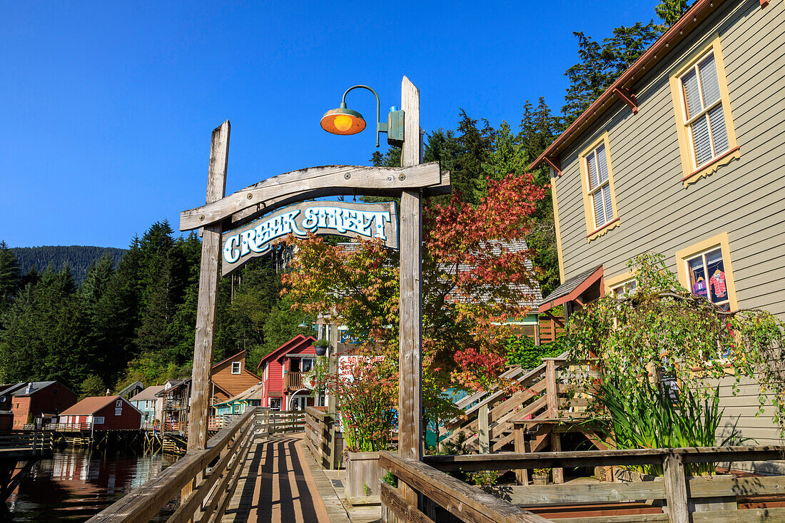 Creek Street, Ketchikan Creek boardwalk, historic red-light district, beautiful early autumn colours, Ketchikan, Alaska, United States of America, North America