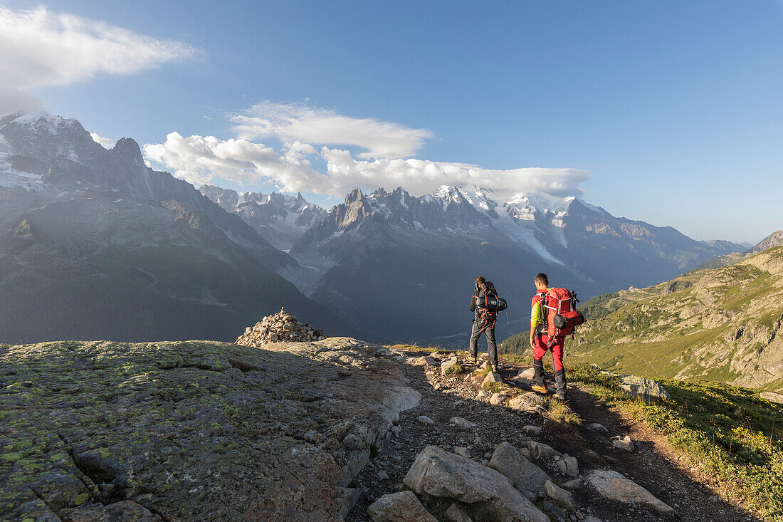 Hikers on footpath leading to Lacs De Cheserys from Argentiere, Haute Savoie, French Alps, France, Europe