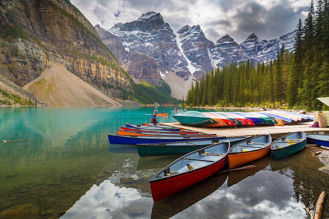 Tranquil setting of rowing boats on Moraine Lake, Banff National Park, UNESCO World Heritage Site, Canadian Rockies Alberta, Canada, North America