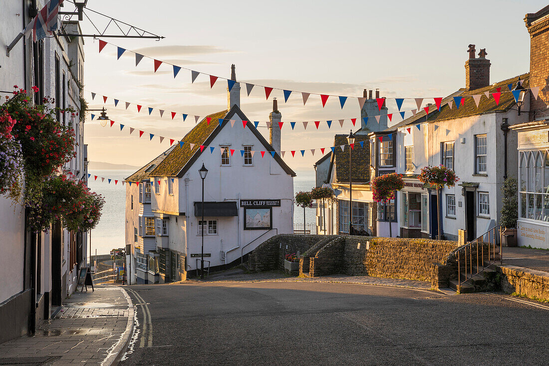 View along Broad Street at sunrise, Lyme Regis, Dorset, England, United Kingdom, Europe