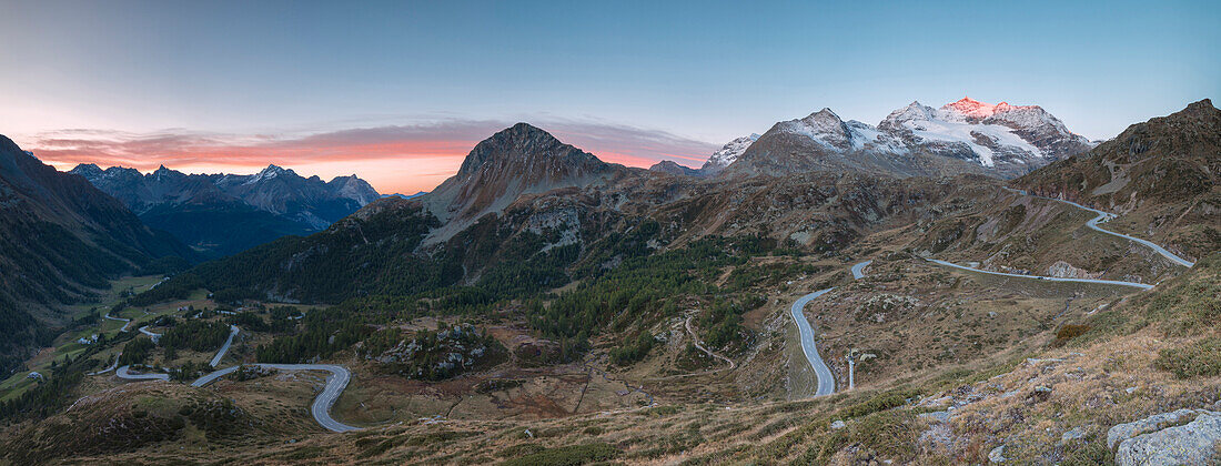 Panoramic of the road bends of Bernina Pass at dawn, Poschiavo Valley, Engadine, Canton of Graubunden, Switzerland, Europe